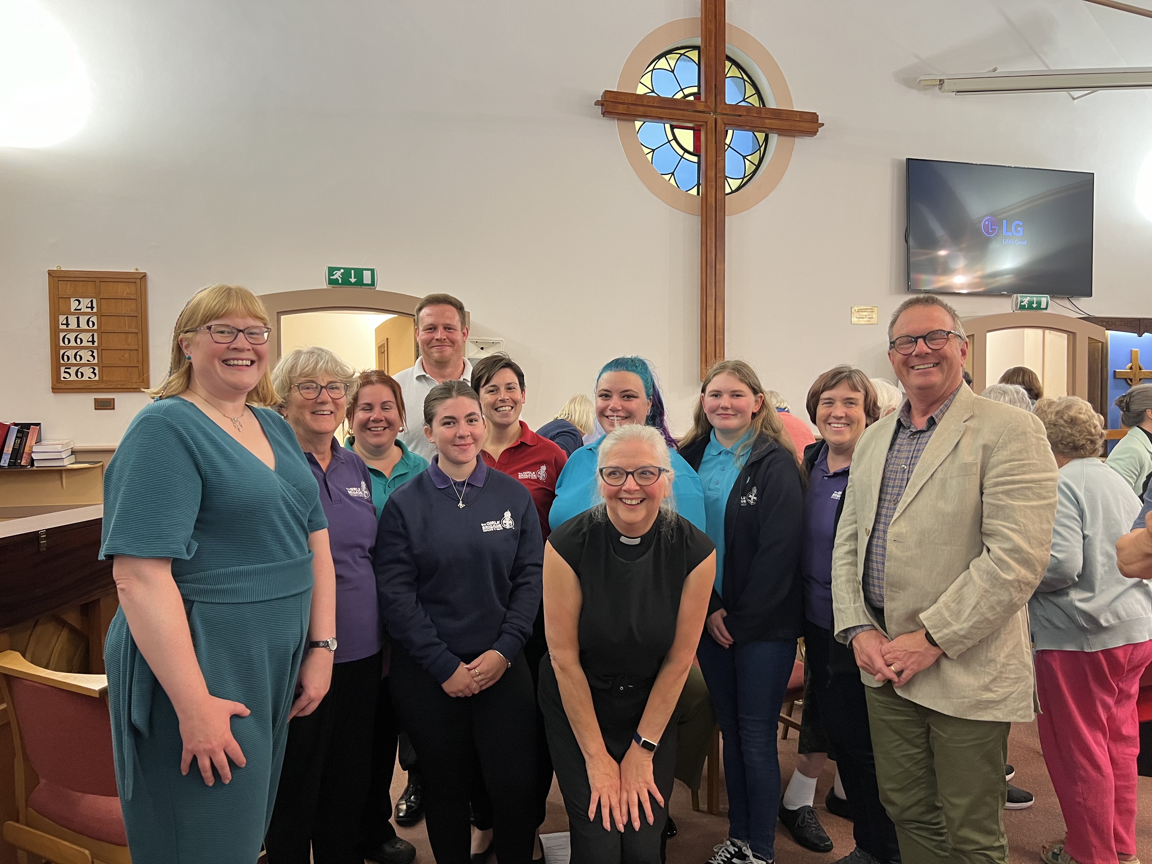 Catherine with District Chair Rachel and NPNP project lead Tizz with some of the 8th Portsmouth Girls' Brigade and 4th Portsmouth Boys' Brigade leaders